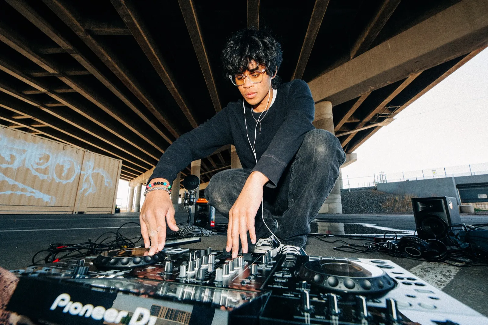phaseeluv playing a pioneer rig under a freeway overpass